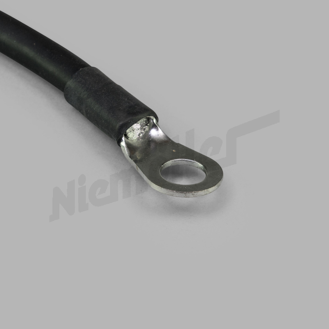 C 54 028a - Przewód uziemiający od akumulatora z biegunami do silnika