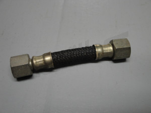 C 08 325 - Flexible hose from leak line to cross piece