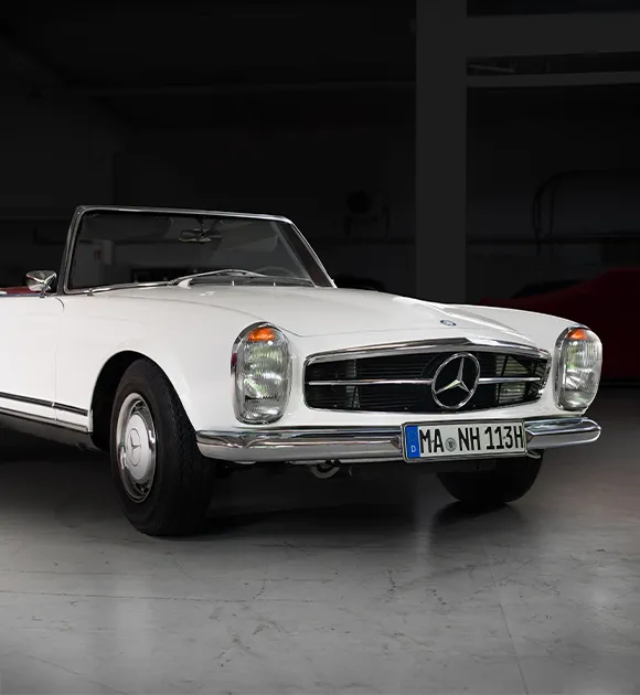     Paul Bracq's Mercedes-Benz W113 Pagoda as an open, white cabriolet. The model was created under the direction of designer Paul Bracq at Mercedes-Benz

